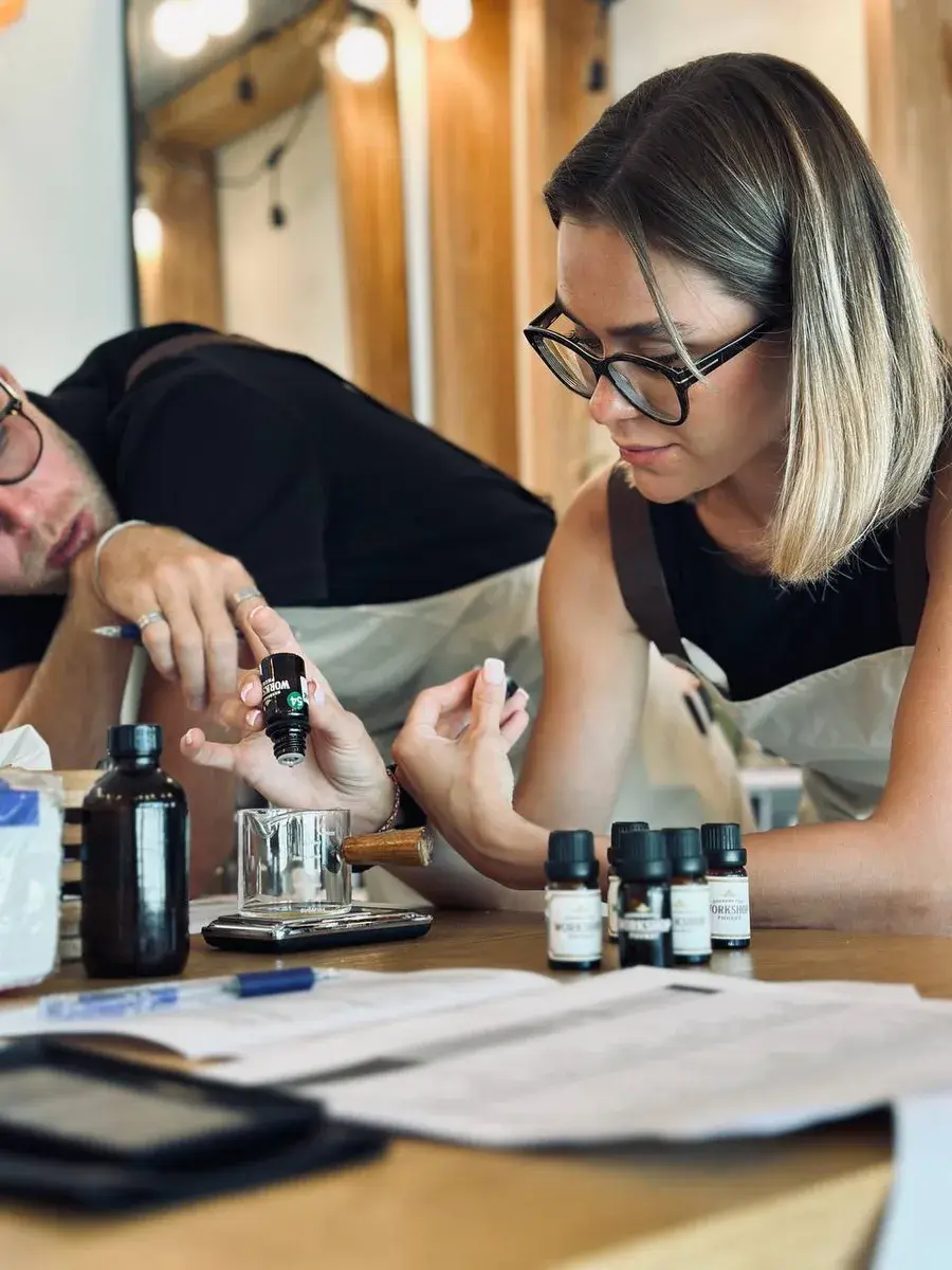 What to do in Phuket — couple creating their own perfume at Herbsmetics Workshop